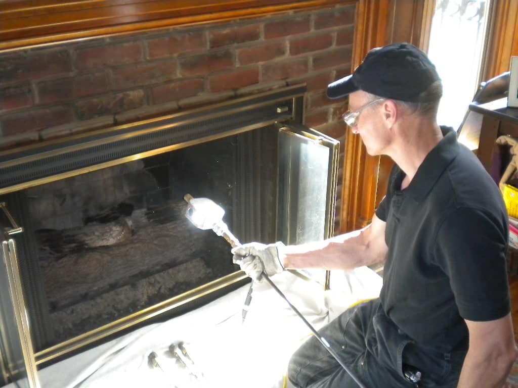 Use creosote sweeping logs and hire a chimney sweep