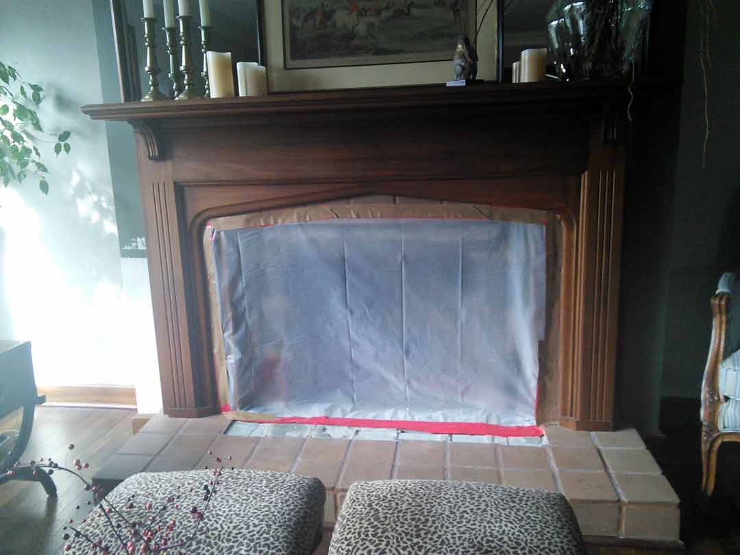 Stop Fireplace Backdrop with Plastic Sheeting