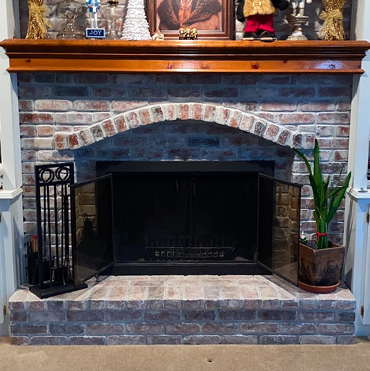 Antique Looking Brickwork with Black Firebox