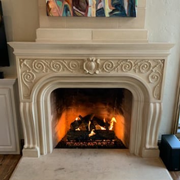 Fancy Surround Mantel with fire burning