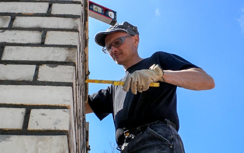 Full Service Chimney™ Owner performs Brick Chimney Repairs in Kansas City 