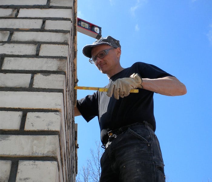 Full Service Chimney Owner Inspecting Chimney