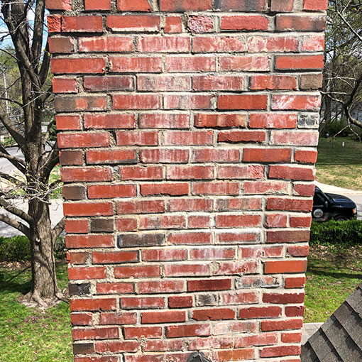 White stuff on your chimney is called Efflorescence