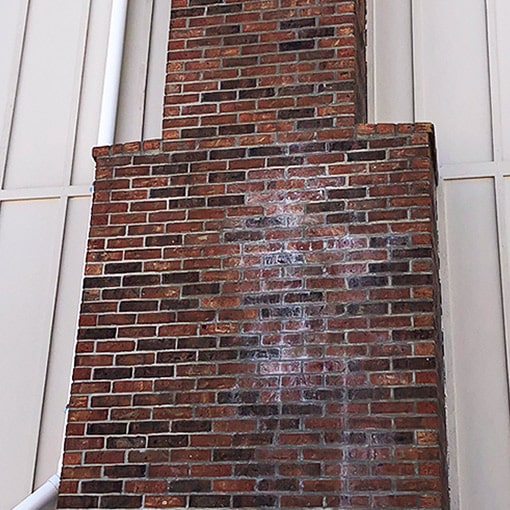 White stuff on your chimney is called Efflorescence