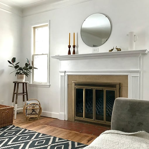 White Mantel fireplace in nice living room