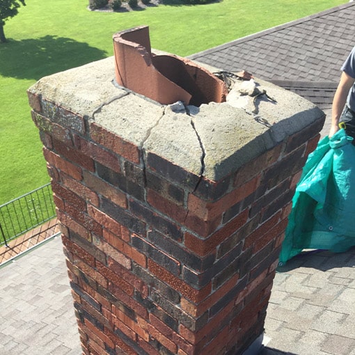 Damaged Flue Tile and Crown in Paola