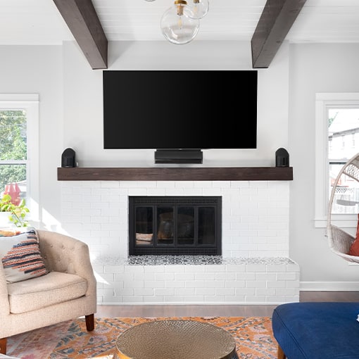 Mounted TV Above Brick Fireplace