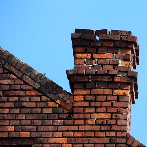 broken brick chimney tilting