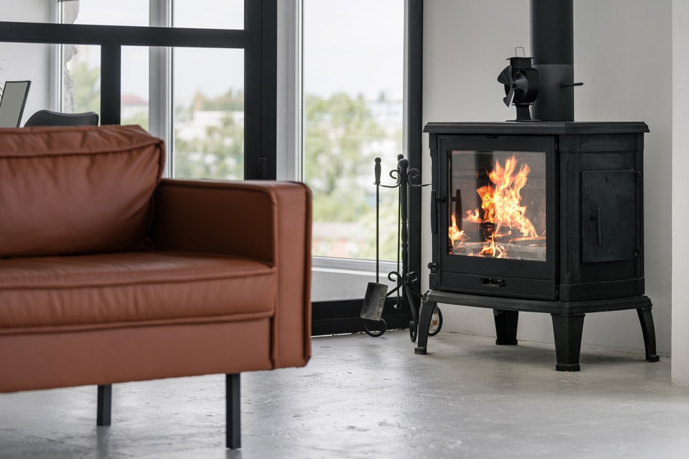 Modern interior house with bright living room and fireplace Modern interior house with bright living room and fireplace