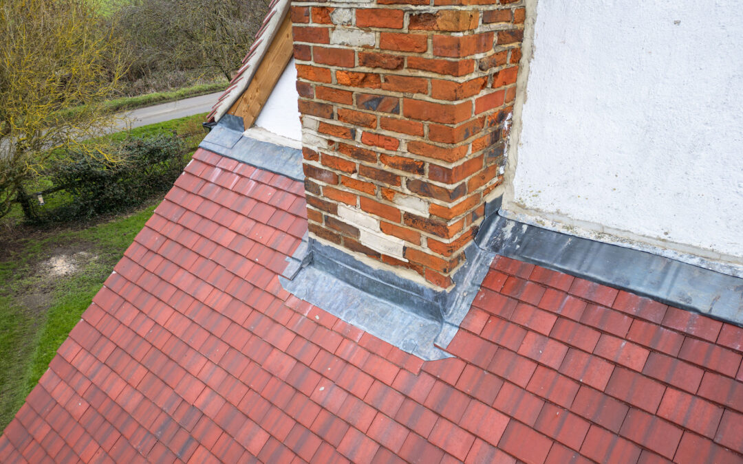 Drone shot of brick chimney in need of repair