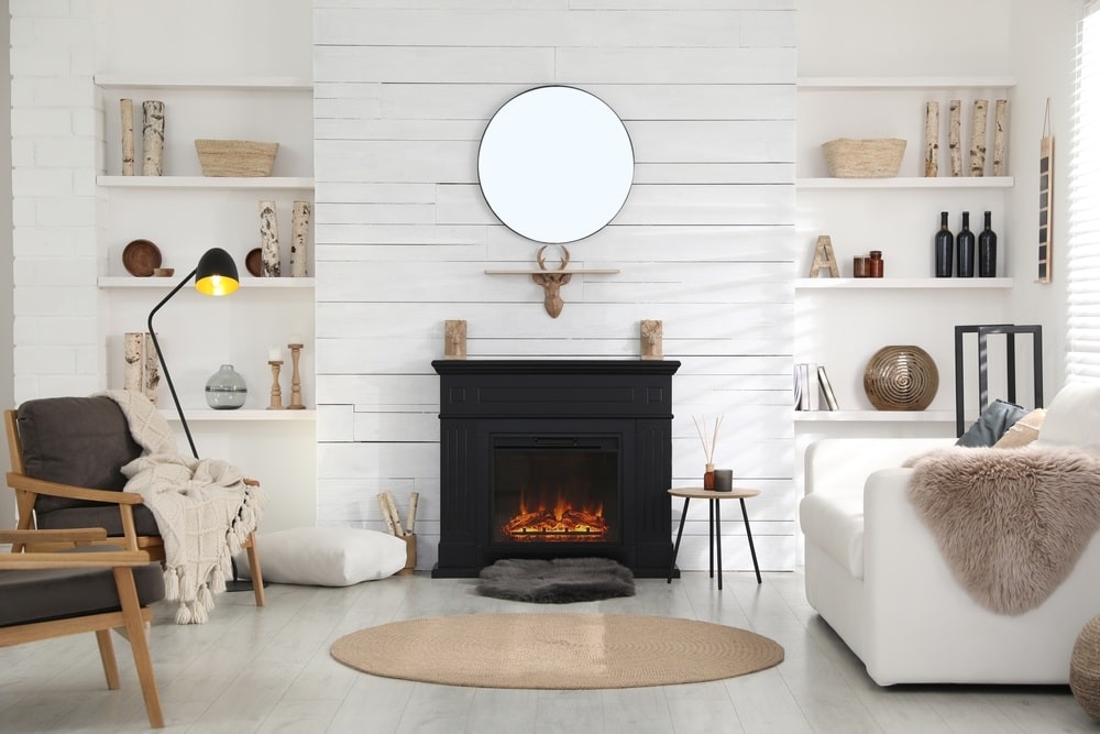 Cozy living room interior with comfortable furniture and modern gas fireplace Cozy living room interior with comfortable furniture and modern gas fireplace